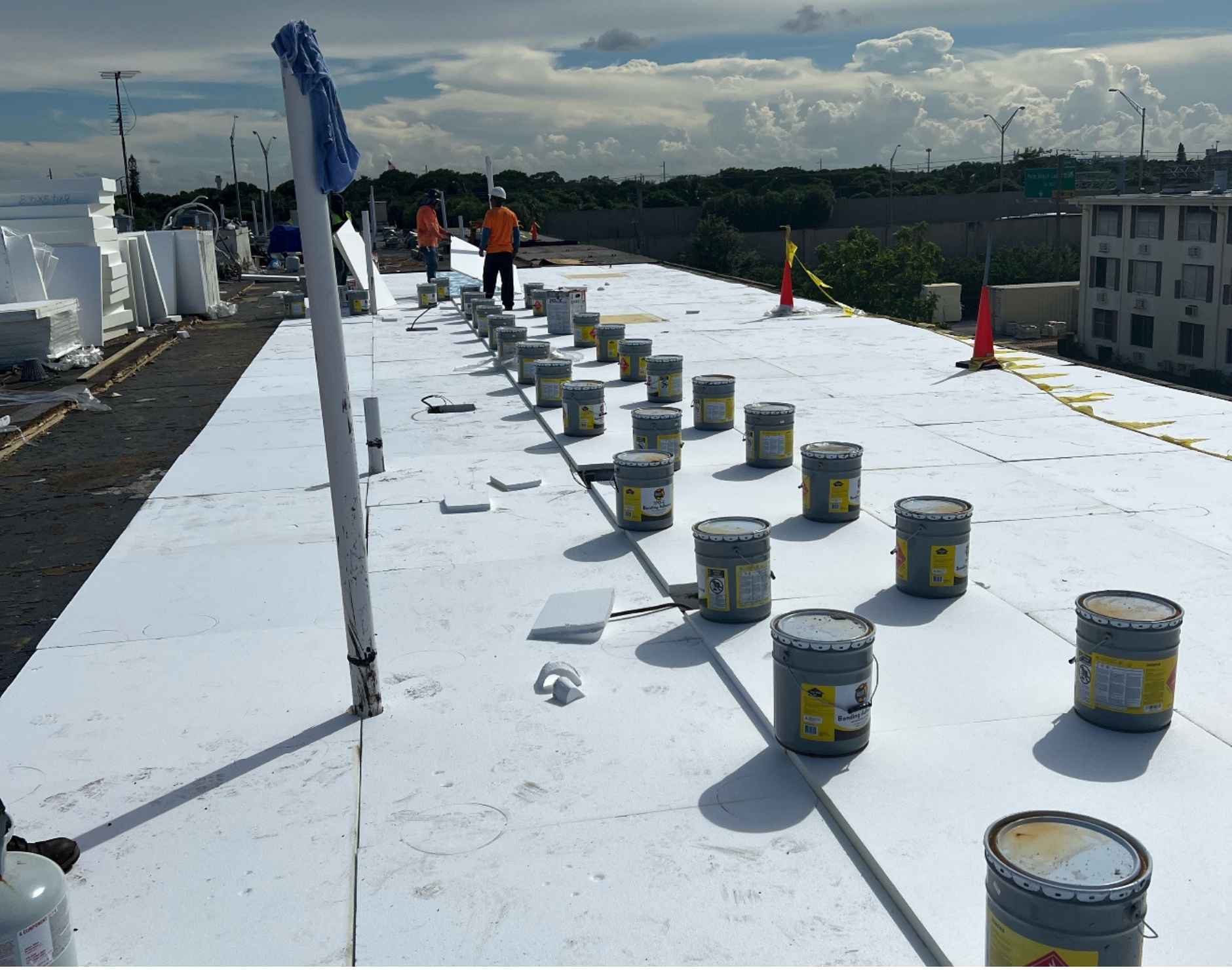 Flat roof drain cleaning services, particularly necessary in Florida to prevent ponding and water damage, typically involve debris removal, clearing of drain strainers, and pressure washing or snaking of drainage pipes. Professional services often include camera inspections to identify deep clogs in commercial or residential systems.